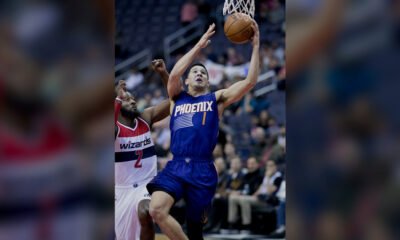 Devin Booker playing for the Phoenix Suns