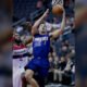 Devin Booker playing for the Phoenix Suns